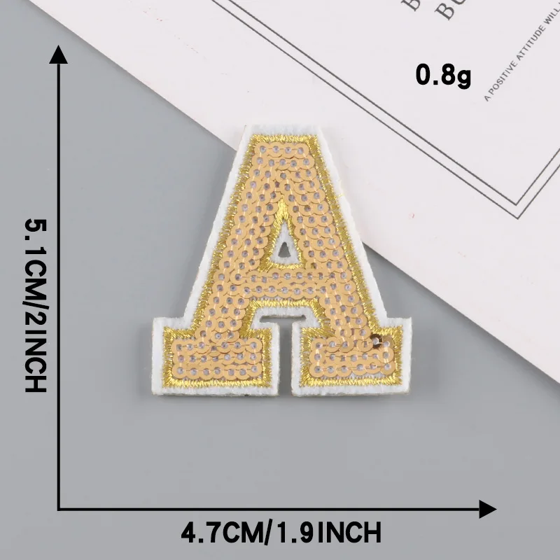 Detalle de las lentejuelas doradas