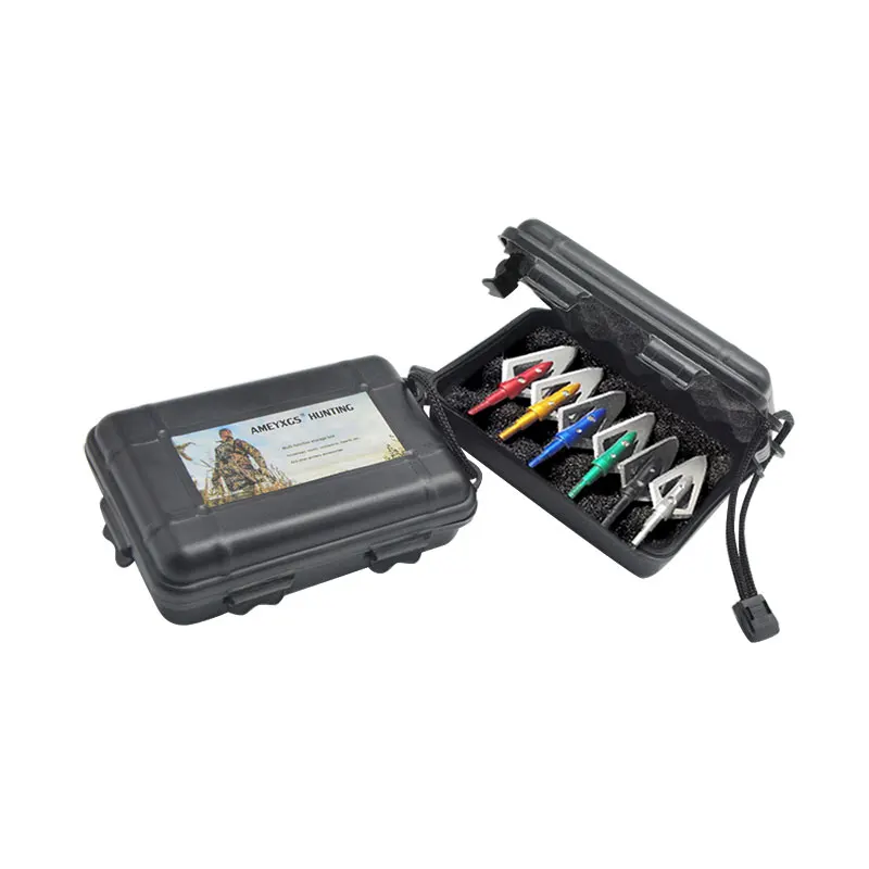 Una caja negra con un inserto de cartón que contiene un conjunto de bolígrafos de color