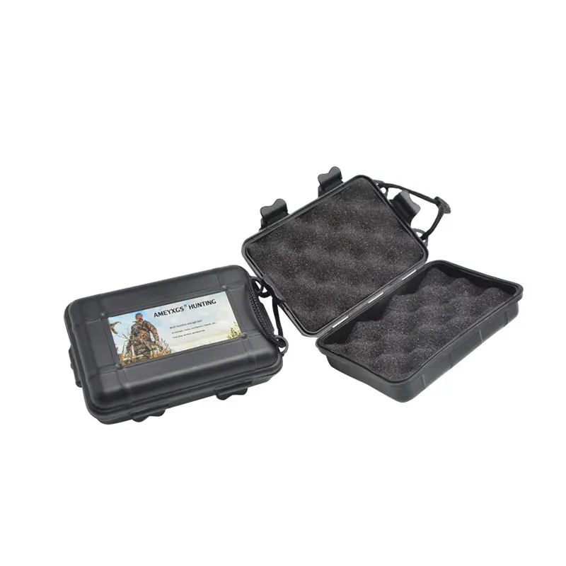 Una caja negra con un inserto de cartón y una caja negra con un inserto de espuma