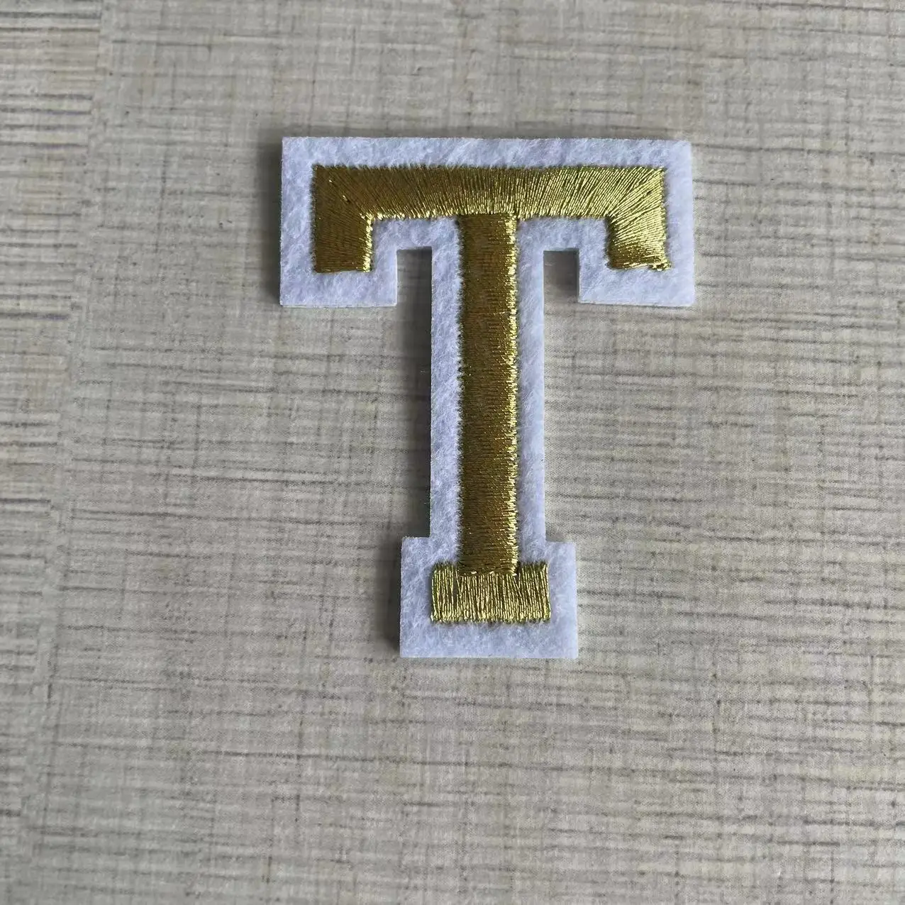 T