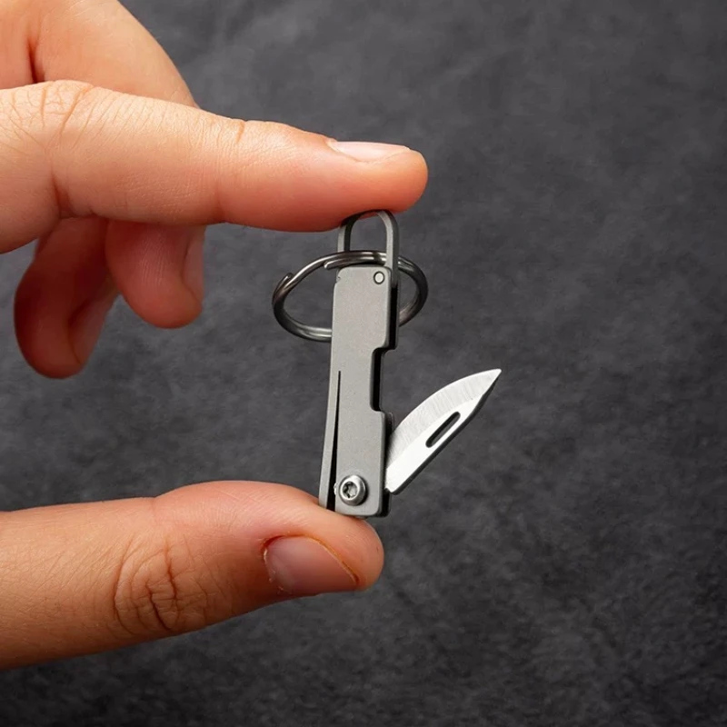 Mini cuchillo plegable de titanio para acampada EDC llavero - imagen 4