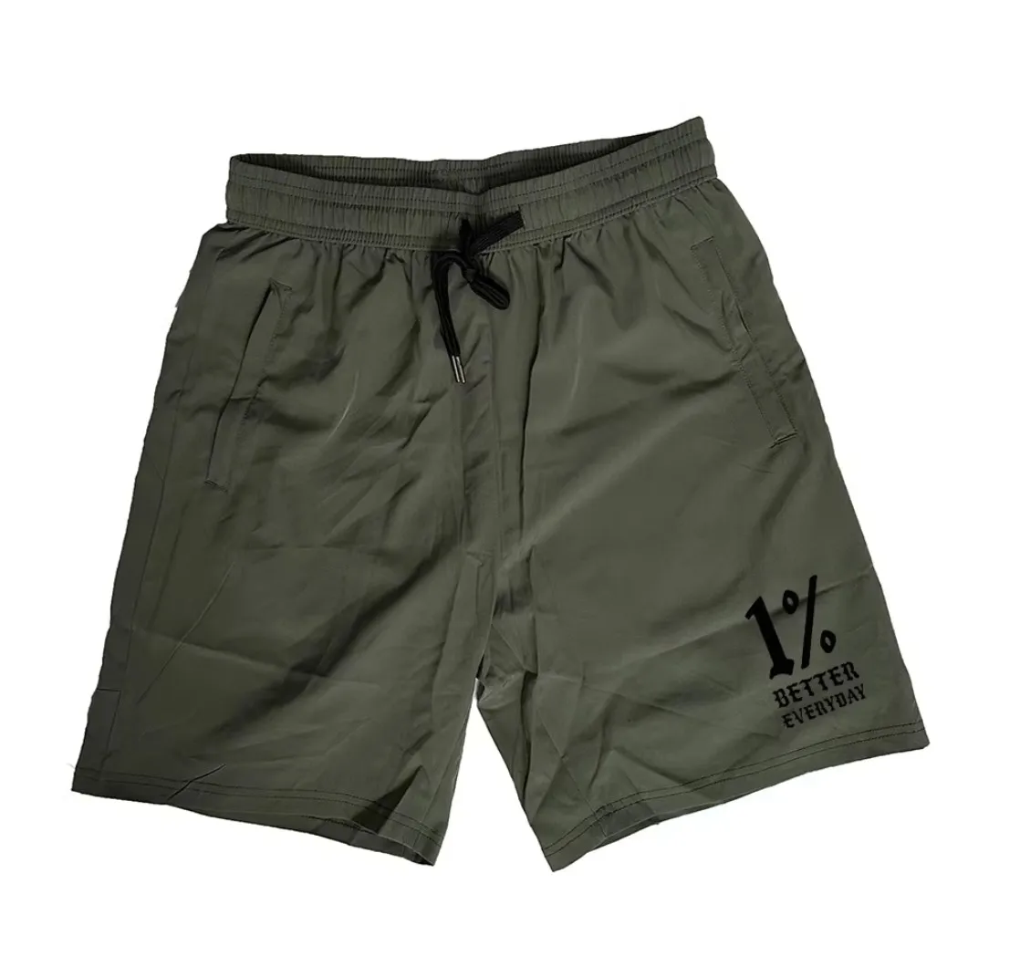 Pantalones cortos secado rápido negro/verde para aire libre y correr - imagen 5