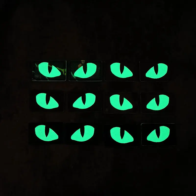 Parches tácticos luminosos de ojos de gato que brillan en la oscuridad, apliques de combate para exteriores, insignias para ropa, decoración de mochila de casco, 1 par - imagen 2