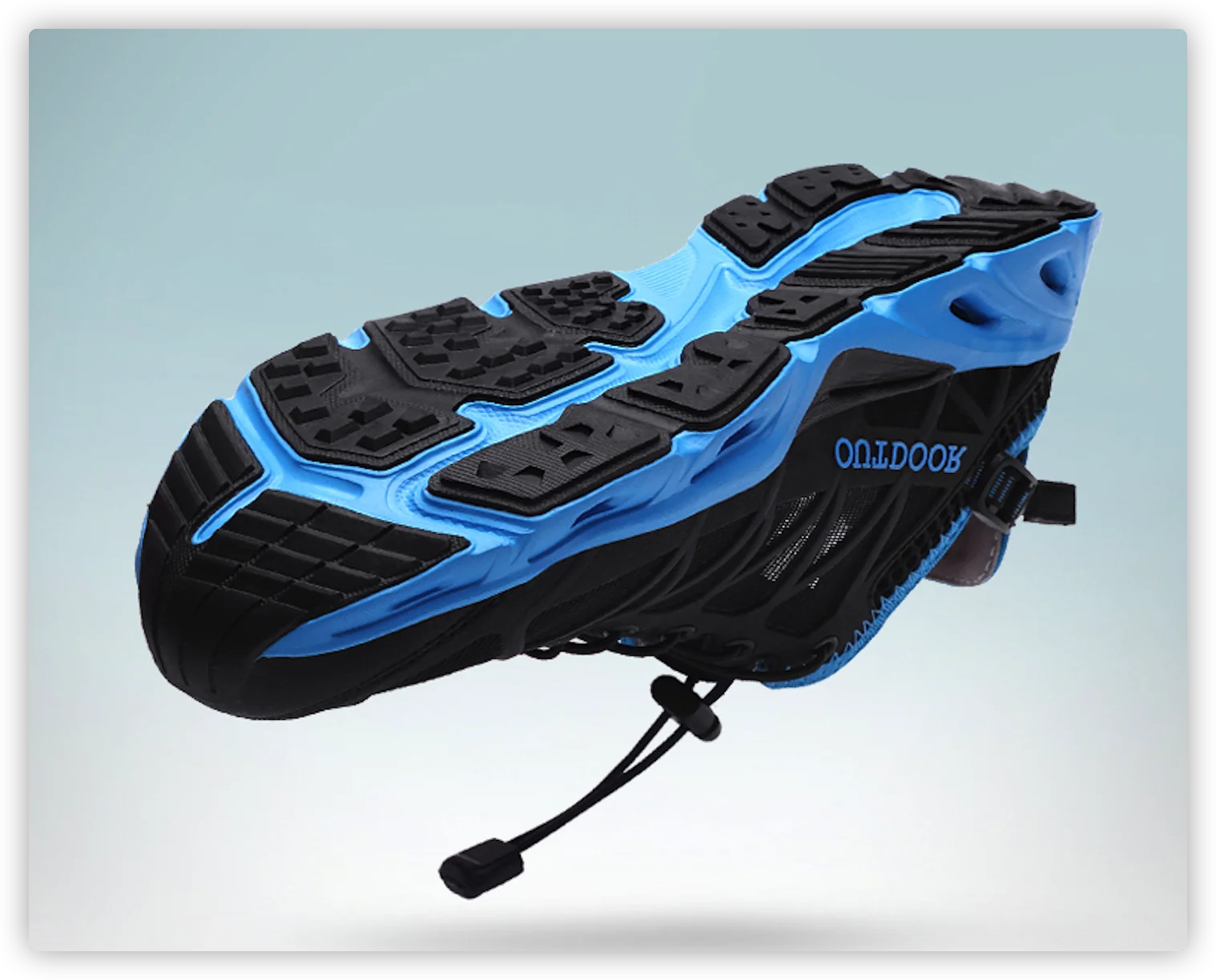 Un zapato azul y negro con una suela blanca