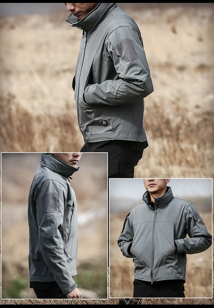 Un hombre que lleva una chaqueta gris con la capucha hacia arriba