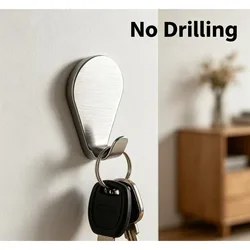Gancho metálico individual sin perforaciones para pared y ropa