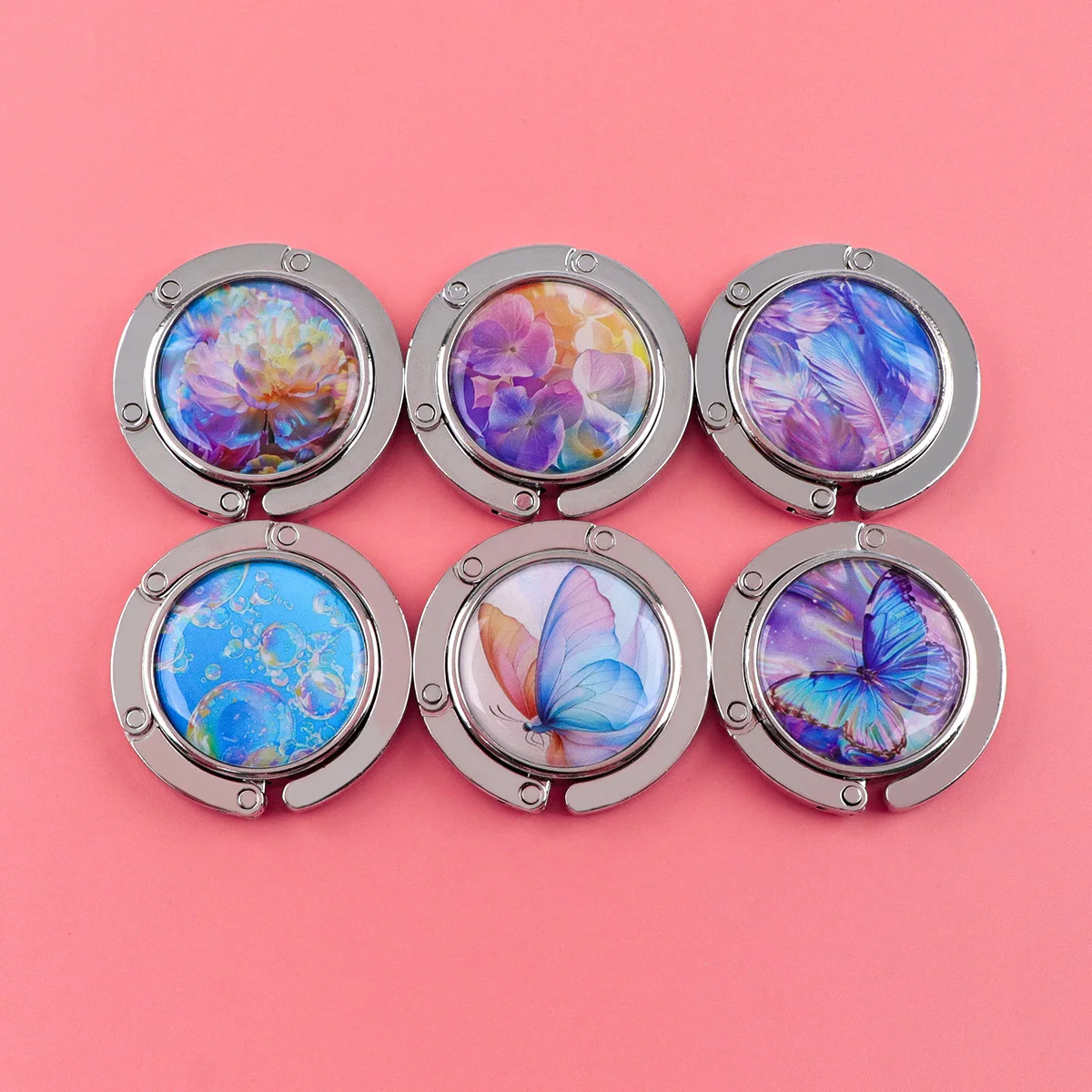 Ganchos para bolsos de mariposa, soportes plegables de Metal para bolsas de mesa, perchas portátiles para monedero, accesorios de piezas únicas, ganchos antideslizantes - imagen 4