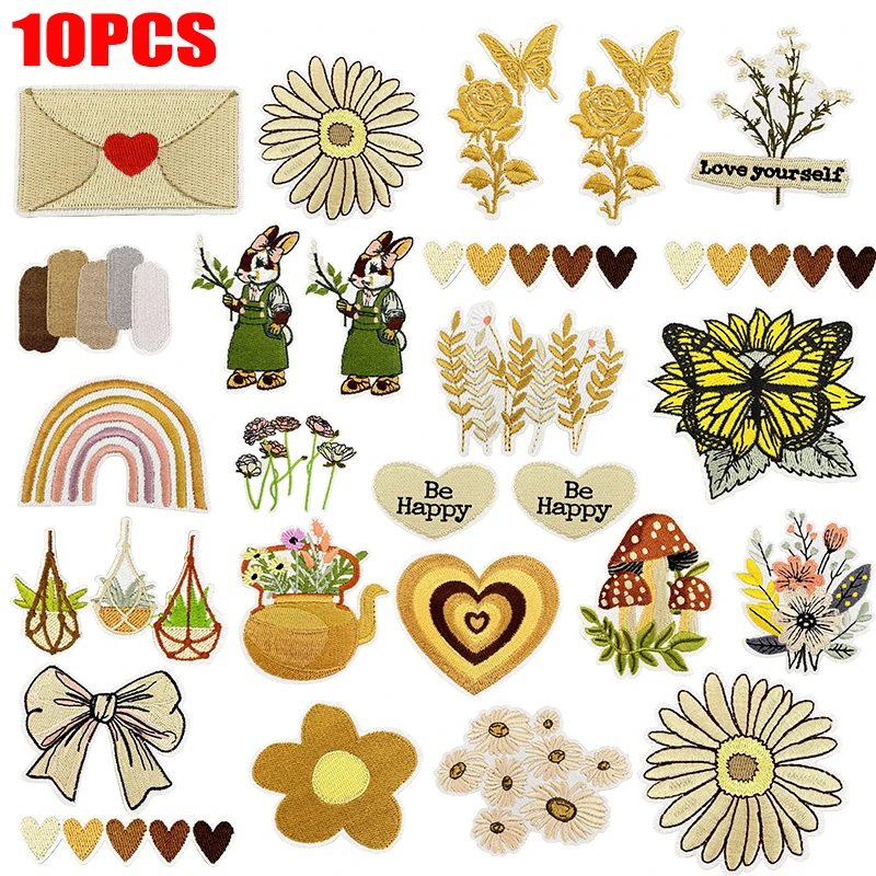 10 unids/lote flores de dibujos animados/arcoíris amor calor parches bordados DIY mariposa seta parche hierro en parches para chaquetas DIY