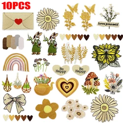 10 unids/lote flores de dibujos animados/arcoíris amor calor parches bordados DIY mariposa seta parche hierro en parches para chaquetas DIY