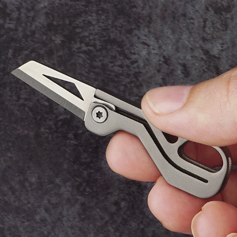Cuchillo EDC plegable titanio TC4 con llavero compacto - imagen 3