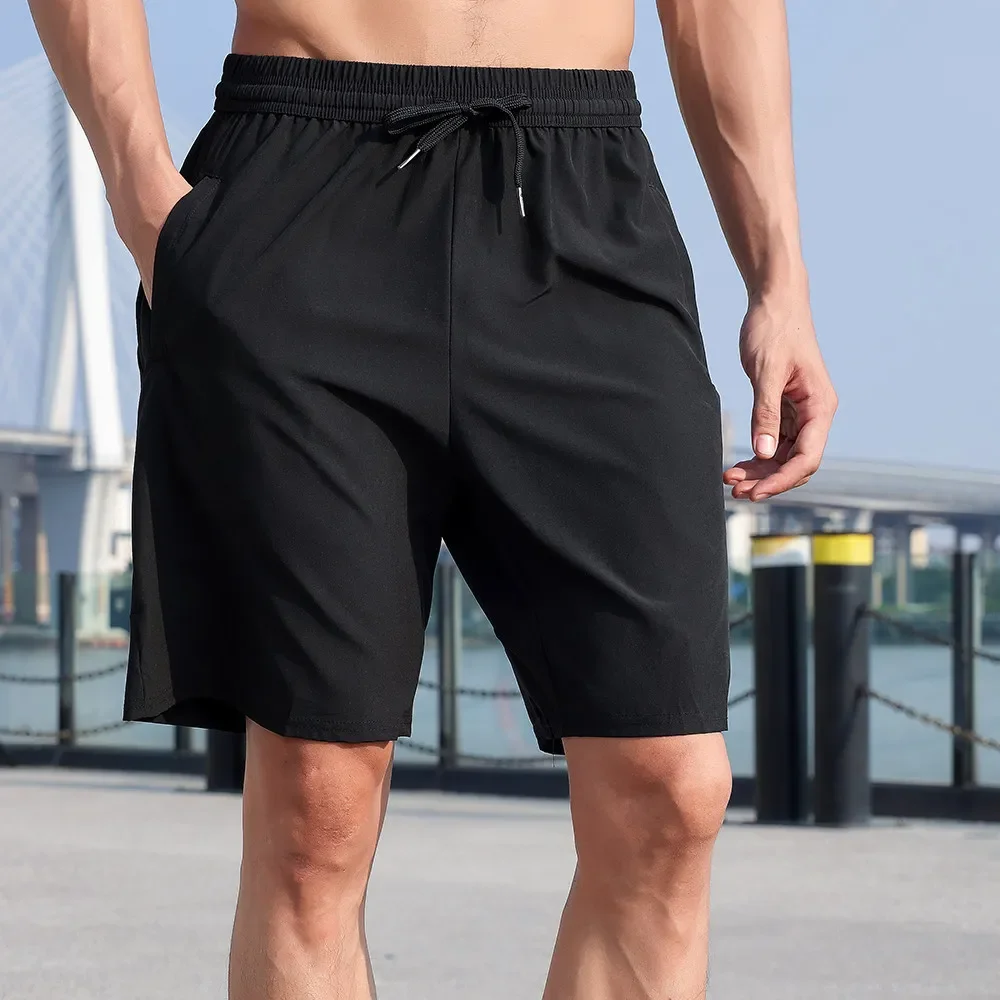 Pantalones cortos secado rápido negro/verde para aire libre y correr - imagen 4