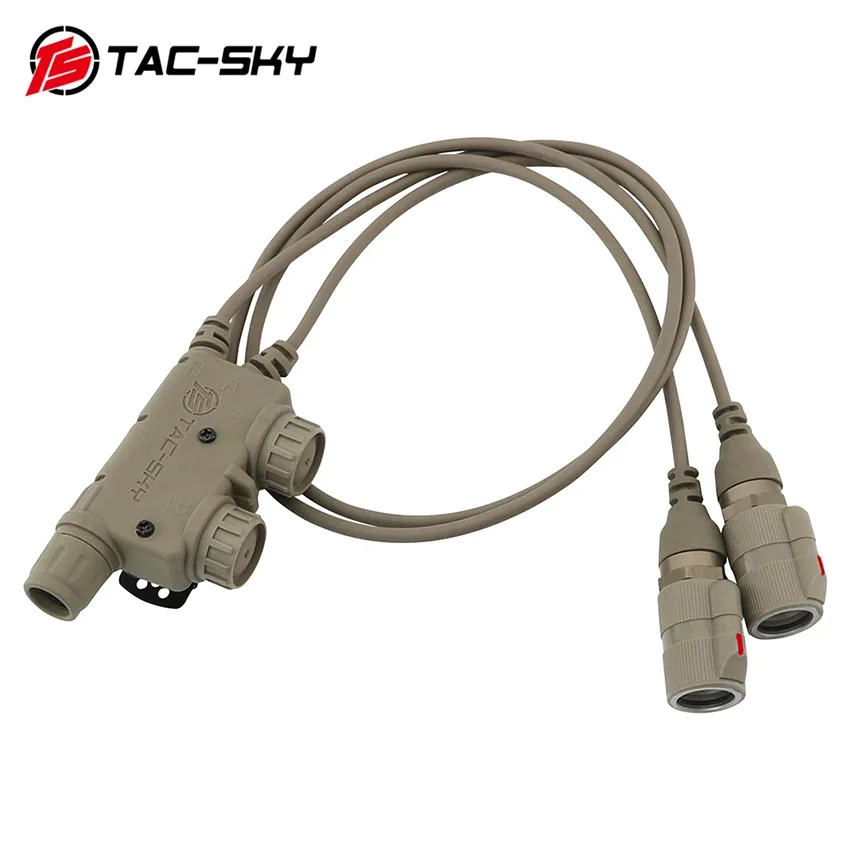 Un cable bronceado con dos enchufes en el extremo