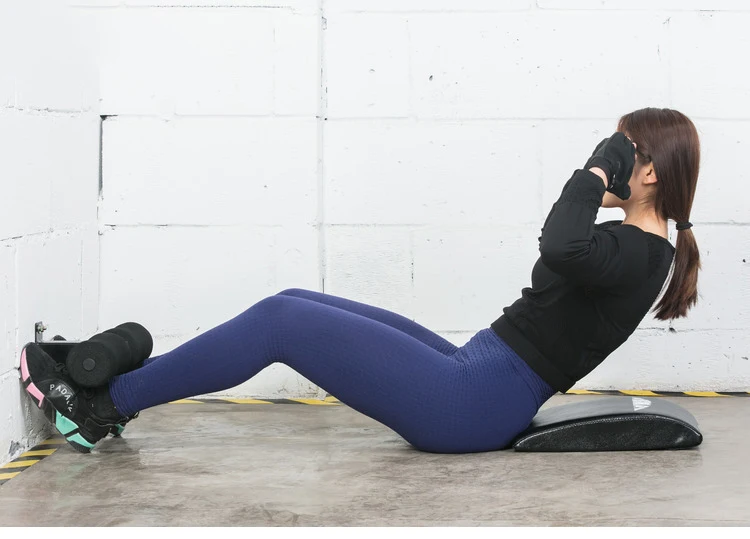 Ejercicio de flexión de tronco en barra ajustable