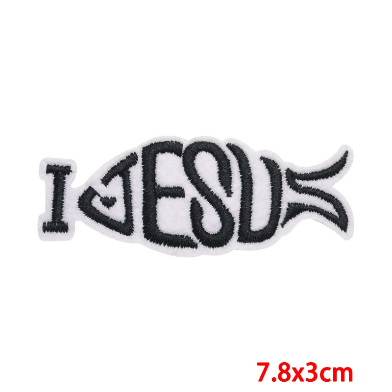 Un diseño bordado en blanco y negro de la palabra Jesús