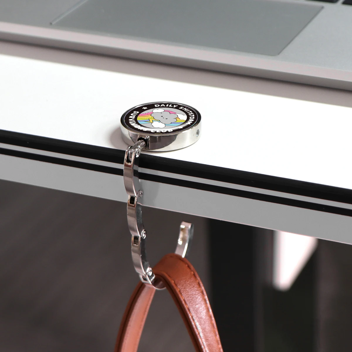 Ganchos para bolsos con citas de tormenta, soportes plegables de Metal para bolsas de mesa, perchas portátiles para monedero, accesorios de piezas únicas, ganchos antideslizantes - imagen 4