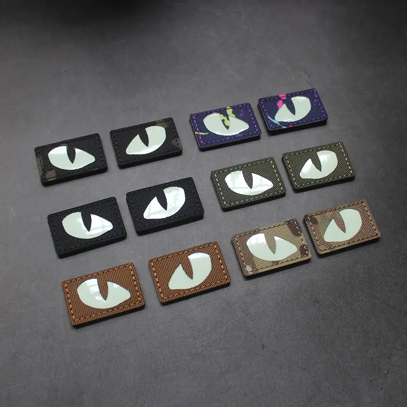 Parches tácticos luminosos de ojos de gato que brillan en la oscuridad, apliques de combate para exteriores, insignias para ropa, decoración de mochila de casco, 1 par - imagen 3
