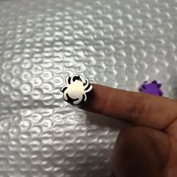 Llavero táctico MOLLE de titanio con diseño araña