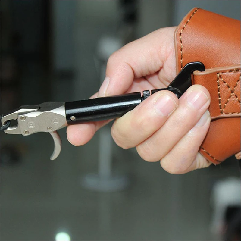 JUNXING tiro con arco lanzamiento de cuero de vaca correa ajustable accesorios de tiro con arco lanzamiento para arco compuesto caza tiro - imagen 3