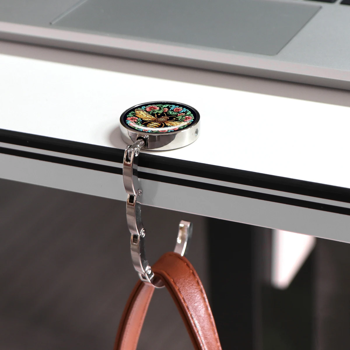 Ganchos para bolsos de abeja, soportes plegables de Metal para bolsas de mesa, perchas portátiles para monedero, accesorios de piezas únicas, ganchos antideslizantes de flores - imagen 4