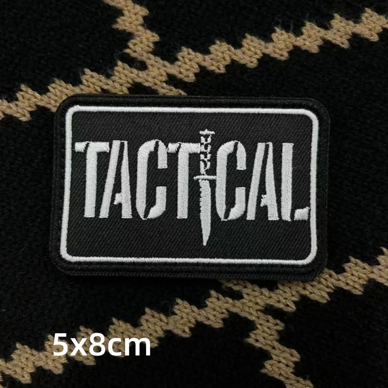 Un parche que dice táctico