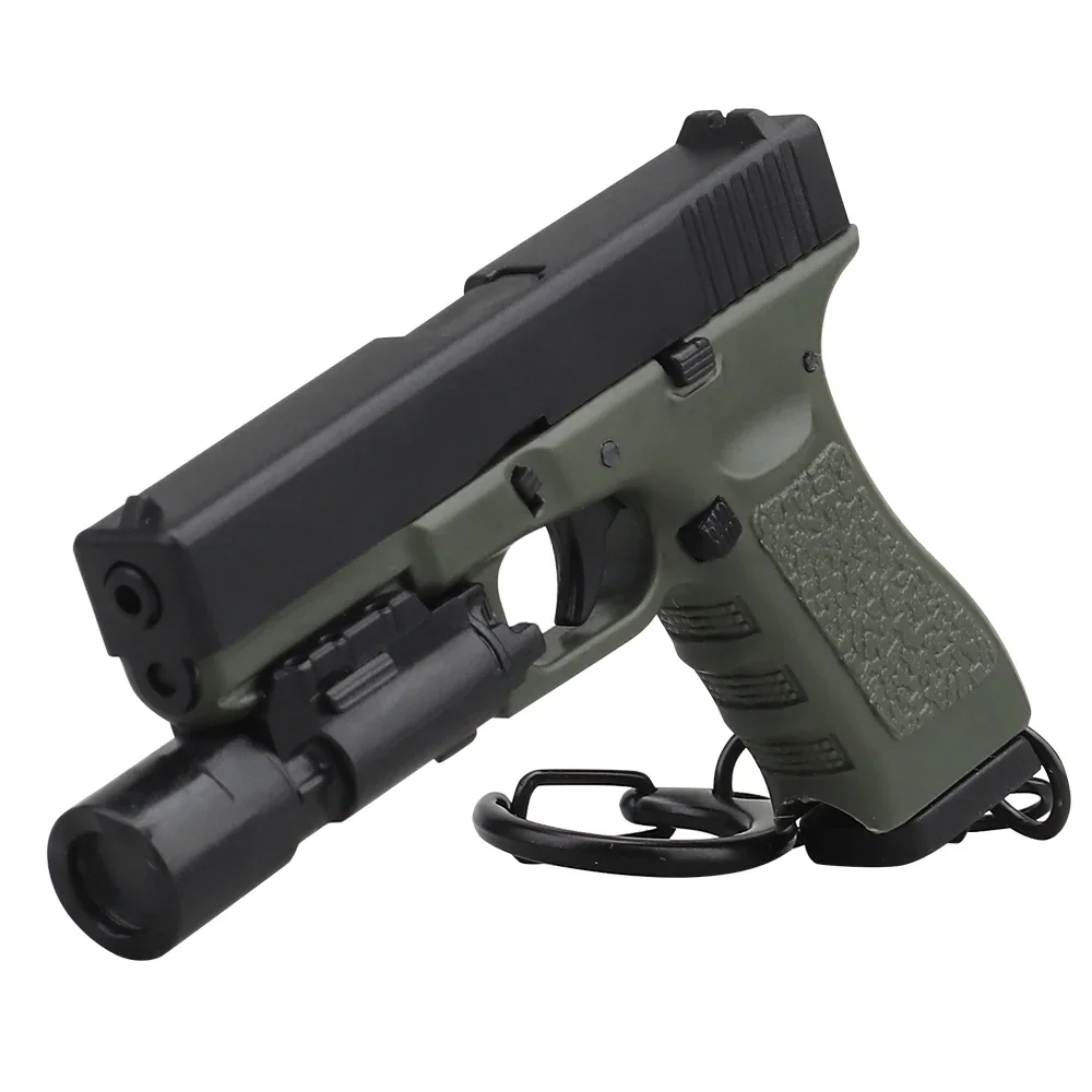 LLavero de G-17 de plástico con forma de pistola, minillavero de arma desmontable con palanca de linterna y cargador, 1:4, regalo - imagen 5