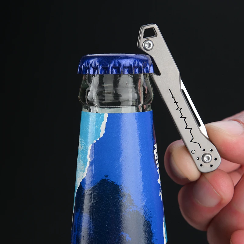 Mini cuchillo plegable titanio con abrebotellas – Llavero táctico - imagen 4