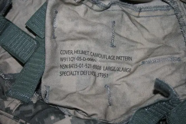 Una bolsa de camuflaje con una etiqueta que dice patrón de camuflaje de casco de cubierta