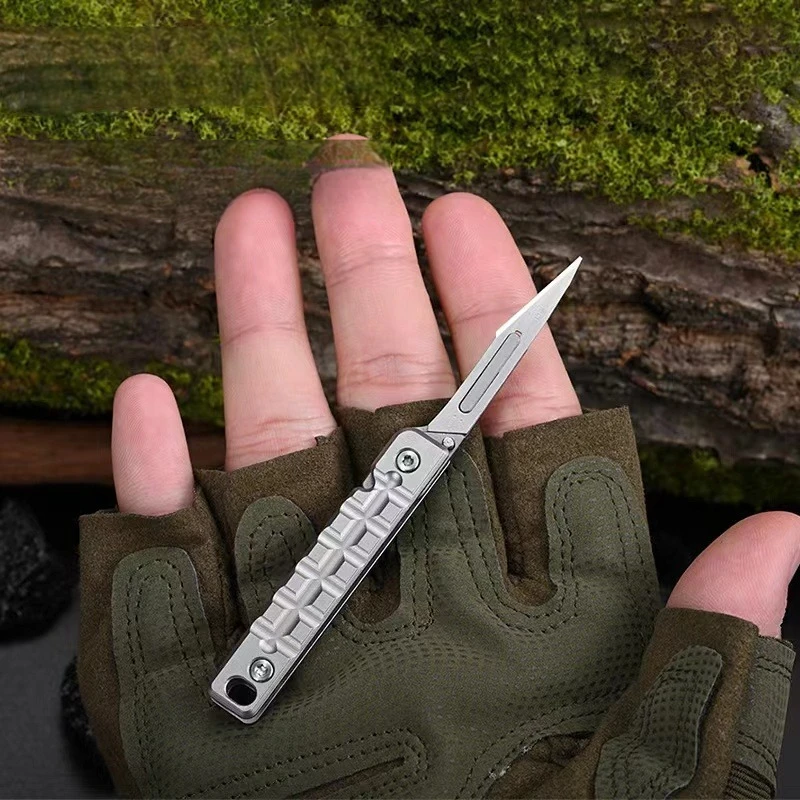 Cuchillo táctico mini plegable de acero inoxidable para llavero - imagen 4