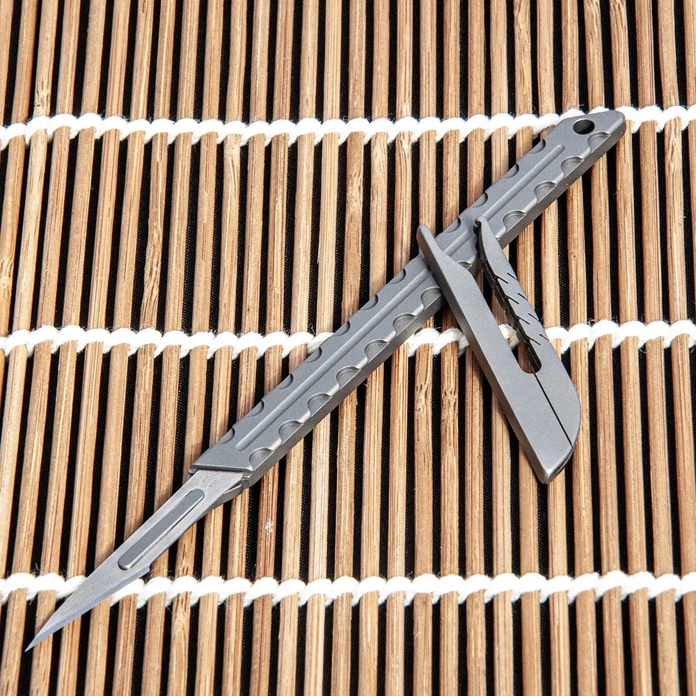 Mango ergonómico de aleación de titanio del cuchillo JIANLAI