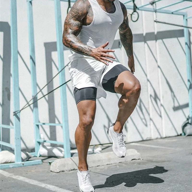 2025 Pantalones cortos de gimnasio para hombre, 2/3 Uds., pantalones cortos transpirables para correr, pantalones cortos de doble capa de secado rápido, pantalones cortos esenciales con múltiples bolsillos - imagen 3