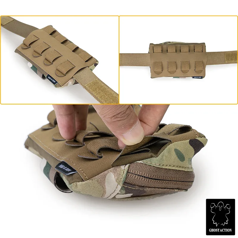 Una persona sostiene una bolsa con una correa y bolsillos