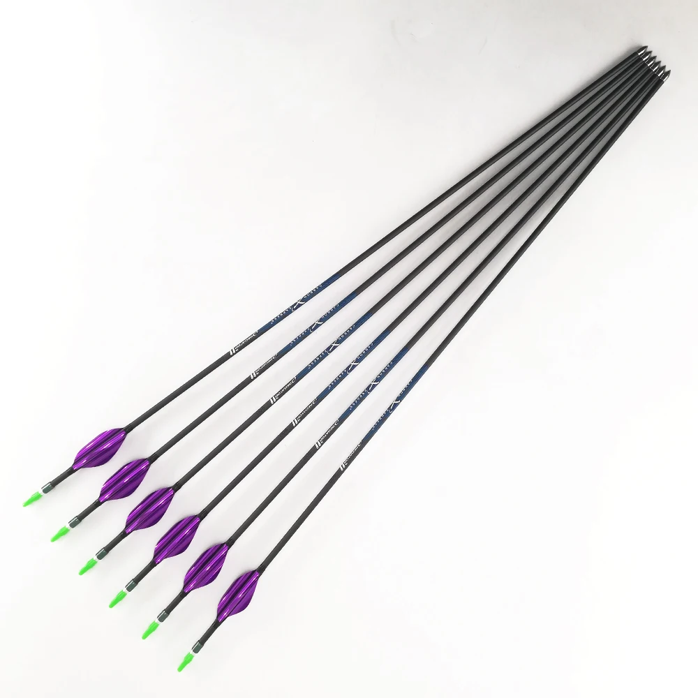 Flechas de carbono equipadas con paletas giratorias y Pin Nock