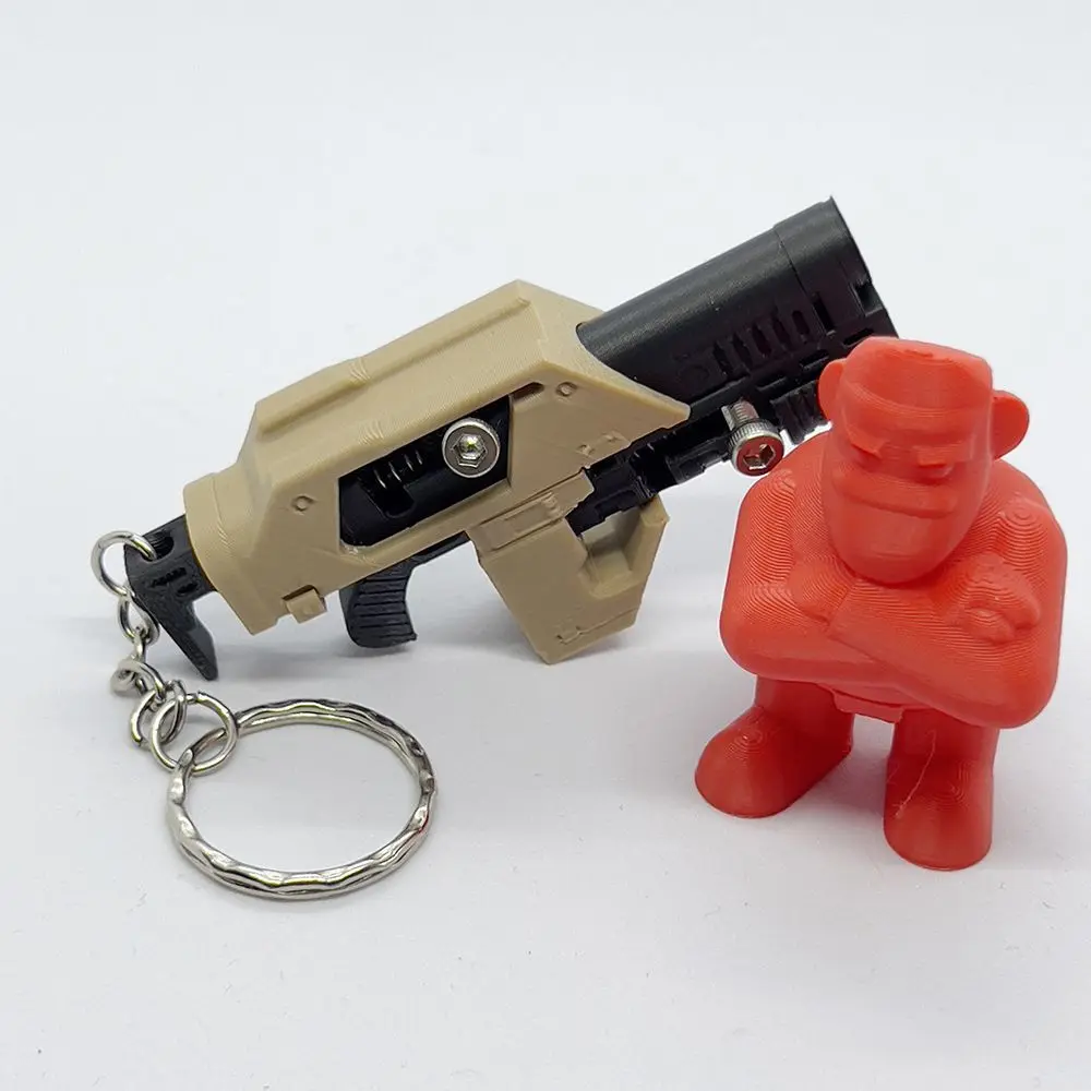 LLavero de Rifle de pulso M41A, juguete funcional BB Blaster, Mini llavero de juguete con pistola BB, llavero impreso en 3D, juguetes de descompresión, regalo para niños - imagen 5