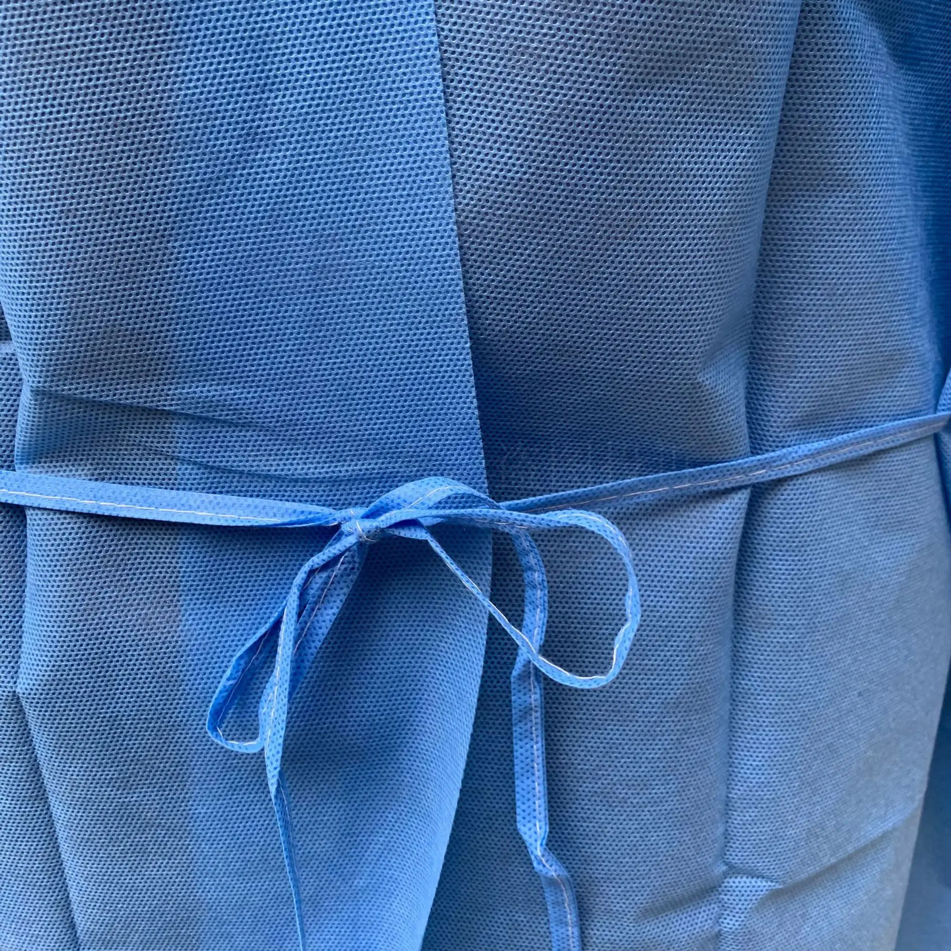 Ropa gruesa desechable no tejida, a prueba de polvo, pintura en aerosol azul, ropa protectora de aislamiento de trabajo, bata de trabajo de enfermería, 10 piezas - imagen 5