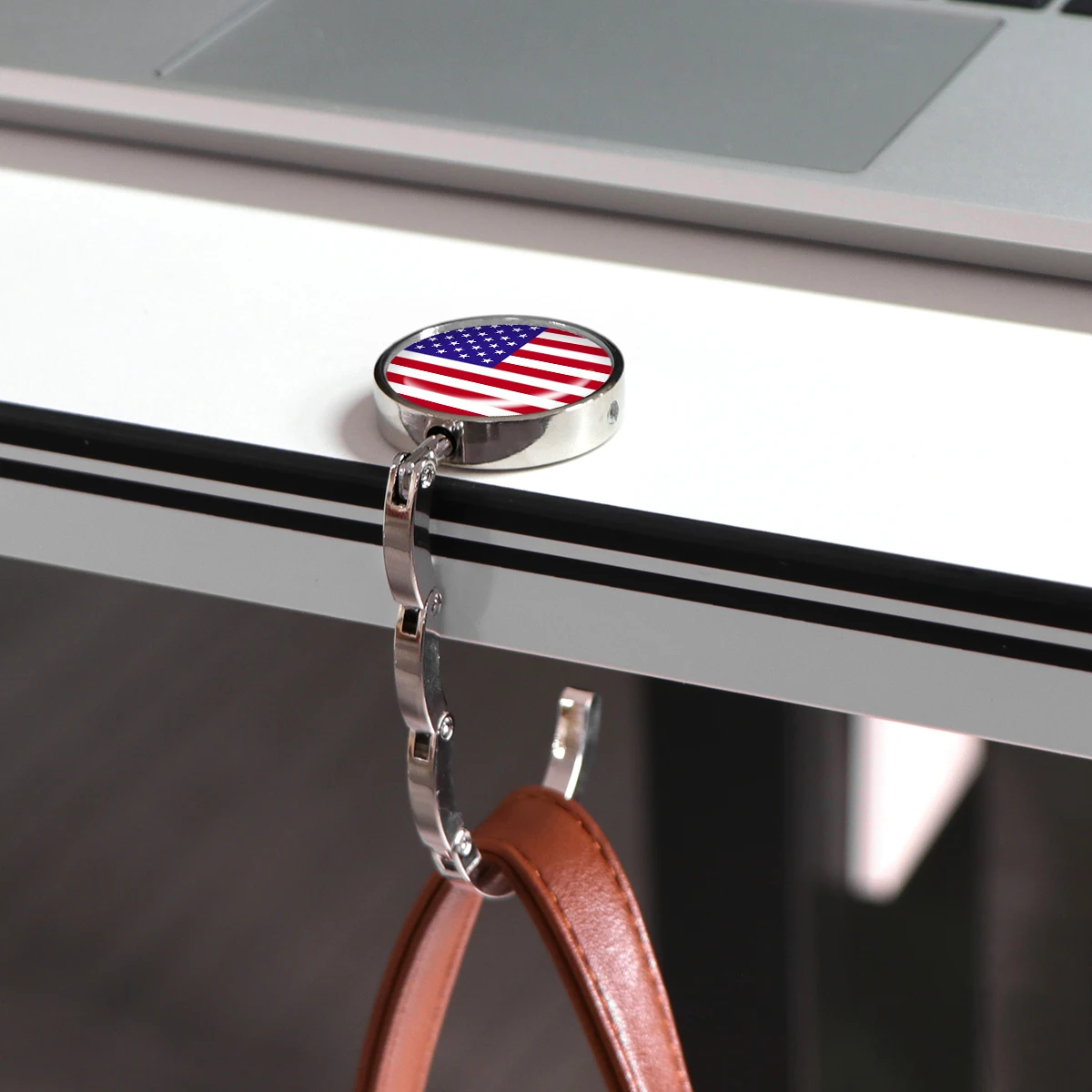 Ganchos para bolsos con bandera americana, soportes plegables de Metal para bolsas de mesa, perchas portátiles para monedero, accesorios de piezas, ganchos redondos antideslizantes - imagen 3