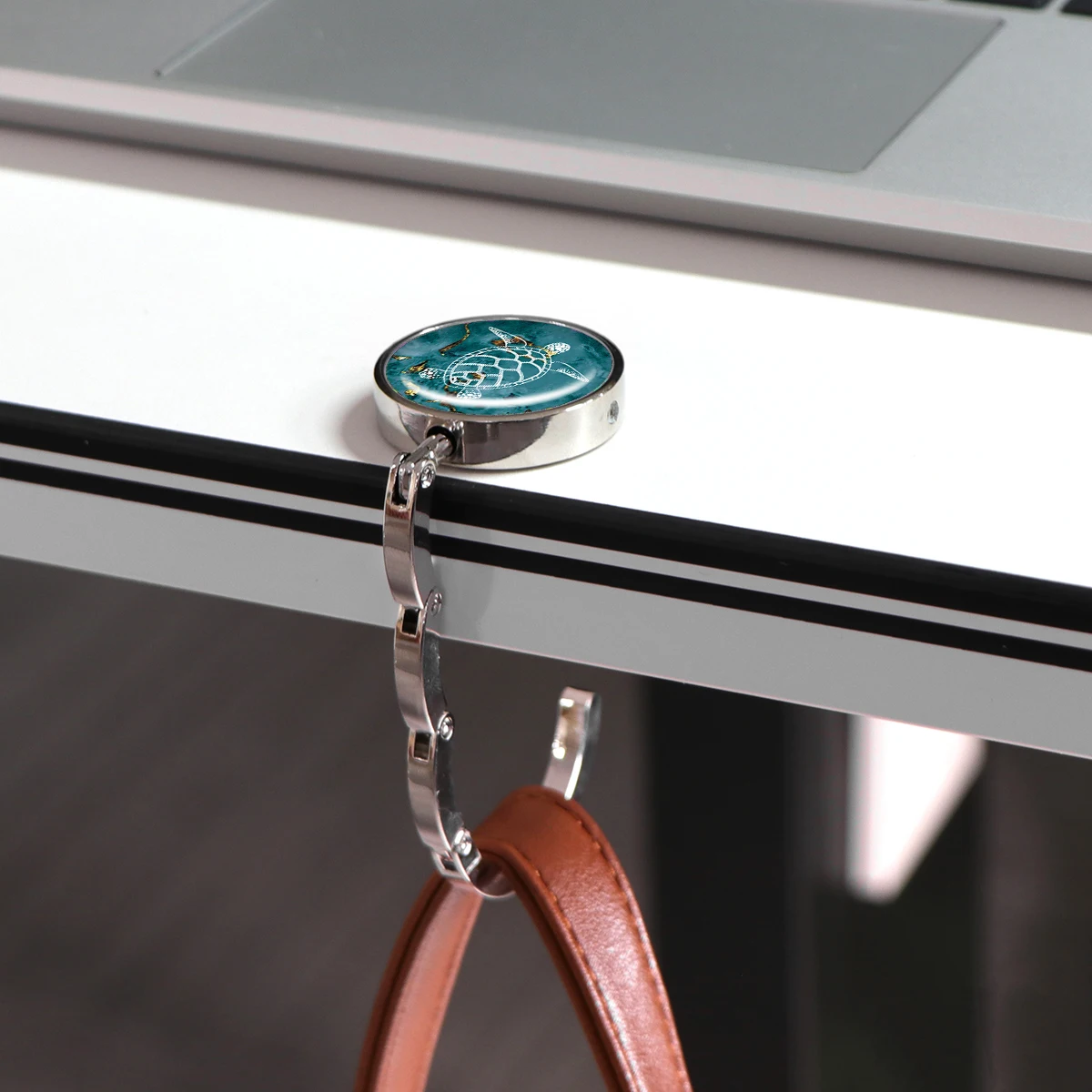 Ganchos para bolso de tortuga marina, soportes plegables de Metal para bolsa de mesa, colgadores portátiles para bolso, accesorios para médico y enfermera, ganchos antideslizantes - imagen 5