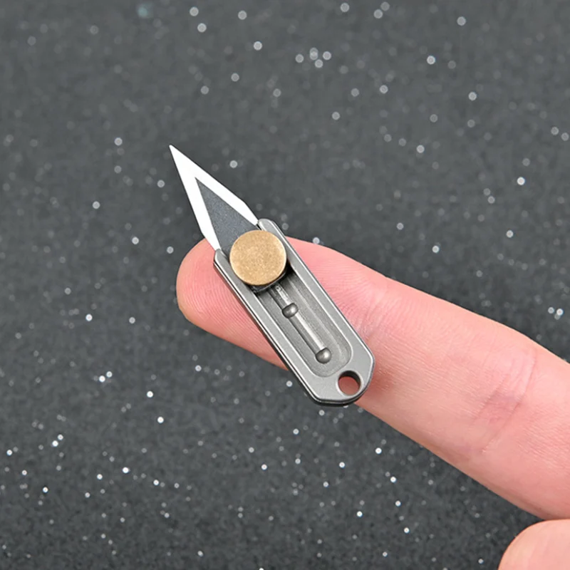 Cuchillo EDC plegable titanio TC4 con llavero compacto - imagen 5