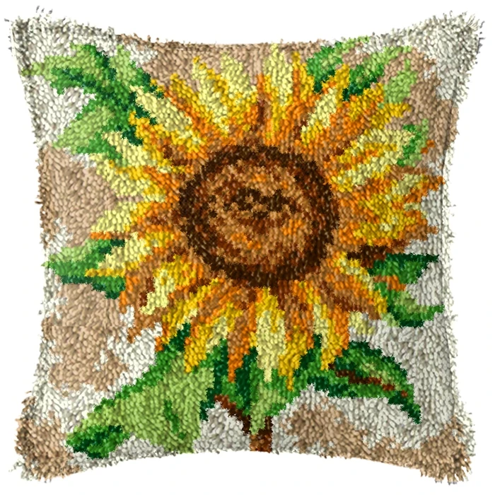 Un girasol es la pieza central de esta almohada de lanzamiento bordada hecha a mano