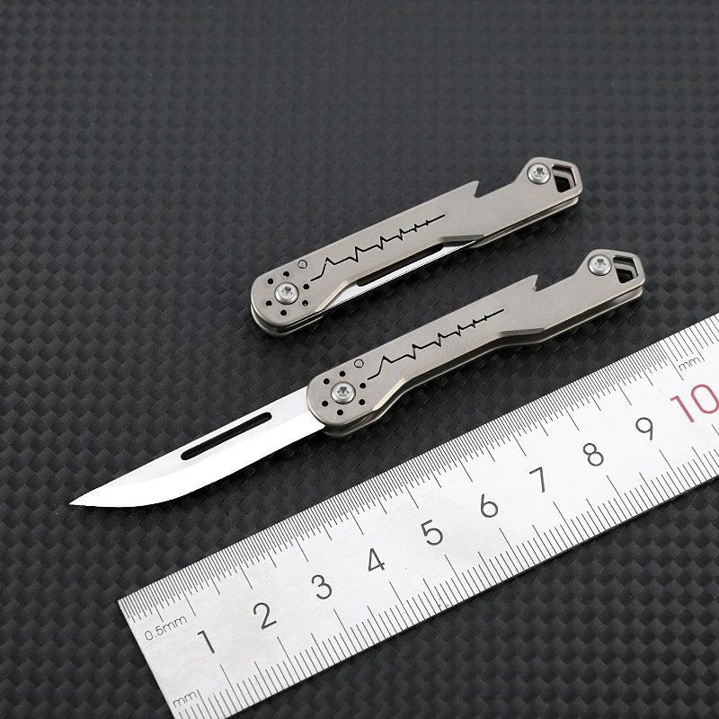 Mini cuchillo plegable titanio con abrebotellas – Llavero táctico - imagen 3