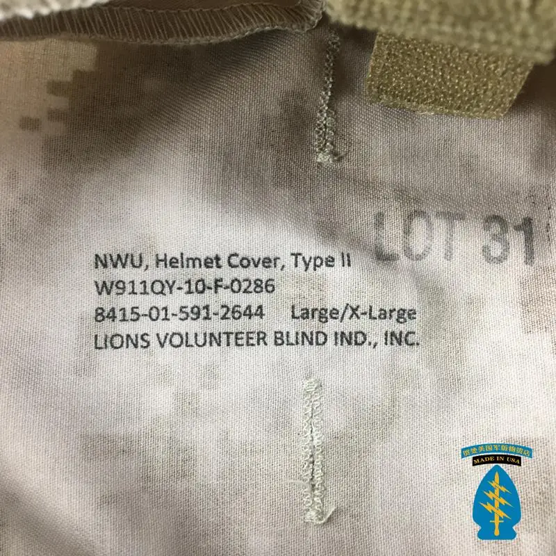 Una tela de camuflaje con una etiqueta que dice Lote 31