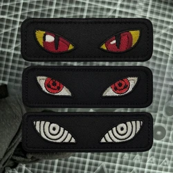 Insignia de moral táctica de ojos malvados, parche luminoso de ojo de gato de Anime, emblema militar, brazalete, gancho, bucle, accesorios para mochila, pegatinas