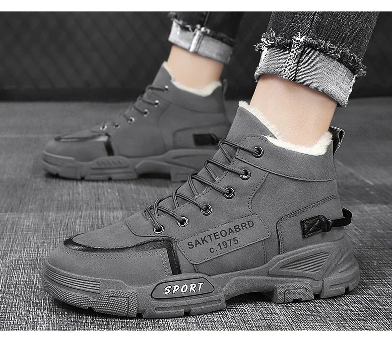 Un par de zapatos grises con suela blanca