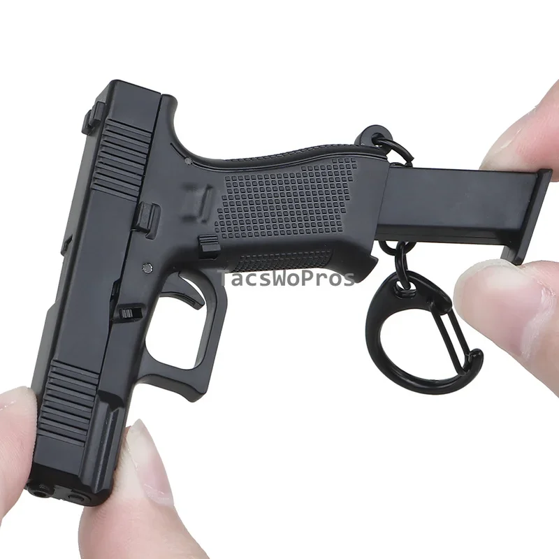 Mini llavero táctico con forma de pistola, llavero ligero de plástico modelo G45, llavero portátil con forma de arma, decoraciones - imagen 5