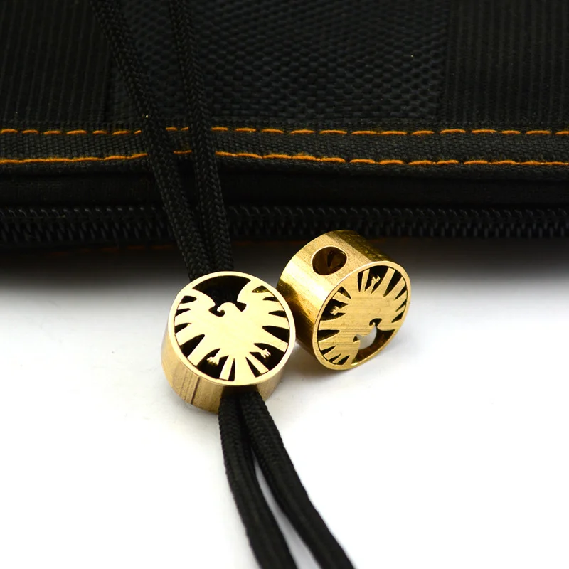 1 unidad de aleación de titanio, latón, S.h.i.e.l.d. Colgante de cuchillo con logotipo, herramientas EDC de moda fresca, cordón, cuerda de paraguas, cuentas, Paracord, Gadget de gota - imagen 2