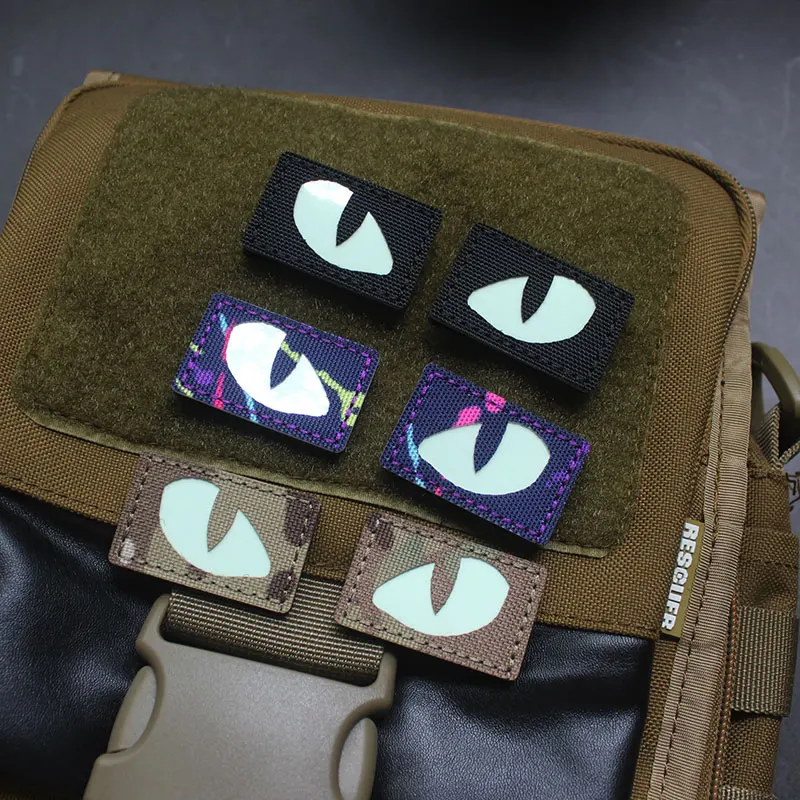 Parches tácticos luminosos de ojos de gato que brillan en la oscuridad, apliques de combate para exteriores, insignias para ropa, decoración de mochila de casco, 1 par - imagen 5
