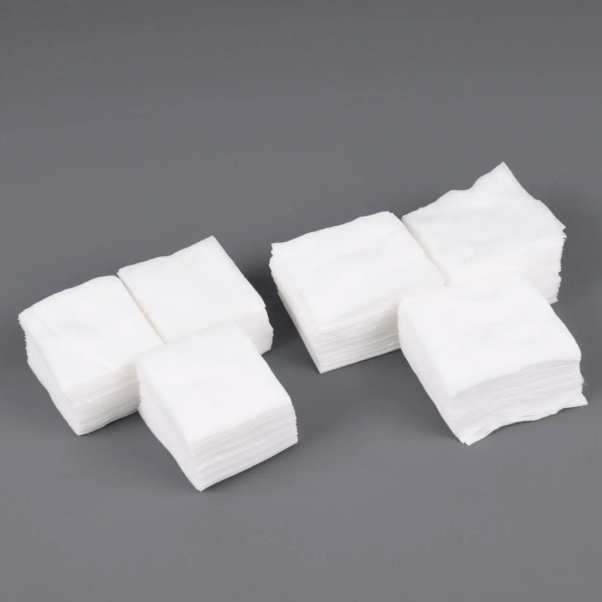 200 Uds parche de limpieza de pistola Rifle pistola escopeta algodón de alta absorción de agua para G17 G19 G22 CZ-75 1911 AR15 AK47 - imagen 2