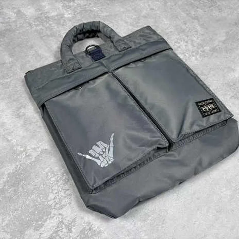 Bolso bandolera bidireccional Aloha Shaka en gris urbano - 26×28 cm - imagen 2