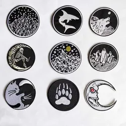 Parche bordado redondo blanco y negro lobo pingüino para planchar