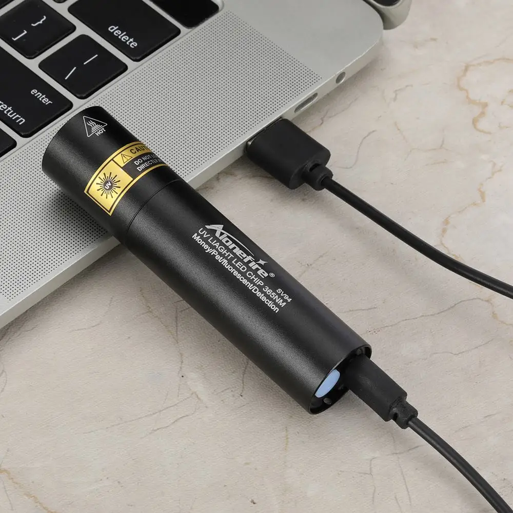 Mini linterna UV recargable 365-395nm – Detección fluidos y materiales - imagen 4