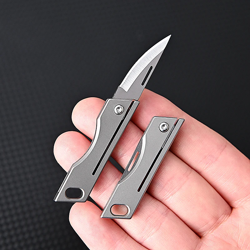 Cuchillo EDC plegable titanio TC4 con llavero compacto - imagen 2